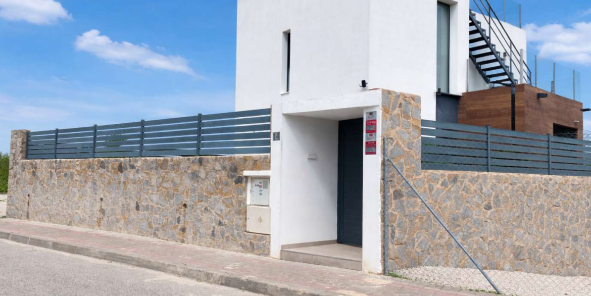 13042_luxury_modern_villa_with_pool__solarium_and_panoramic_views_300326152638_modern_minimalist_villa_with_stone_wall